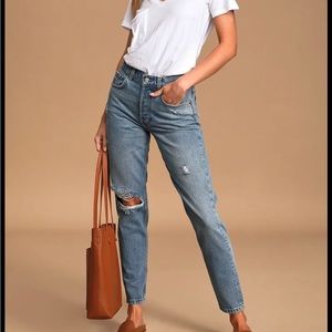 Boyish by her denim jeans